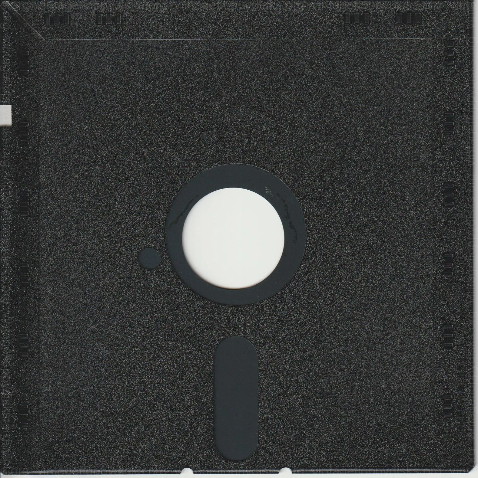 a vintage floppy disk from Generic. Cat. no.: XX-525-0002-001 - Back